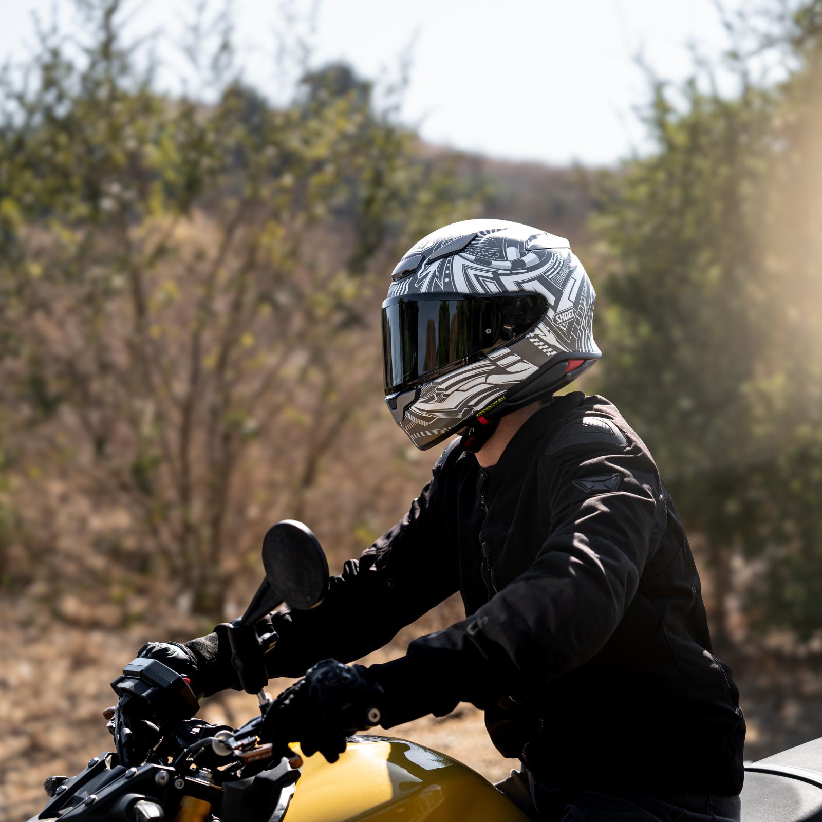 shoei black helmet with black visor Shoei RF-1400 Beaut Helmet